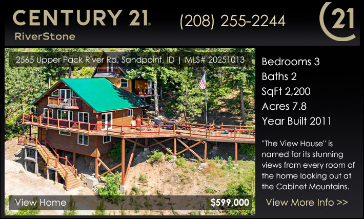 This custom-built home is perched on almost 8 acres to take in the spectacular views